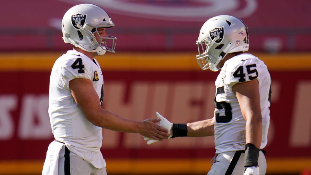 Las Vegas Raiders fullback Alec Ingold (45) hurdles New England Patriots  defensive back J.C. Ja …