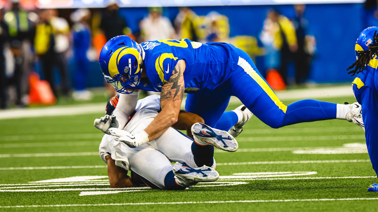 Los Angeles Rams defensive tackle Michael Hoecht sacks quarterback