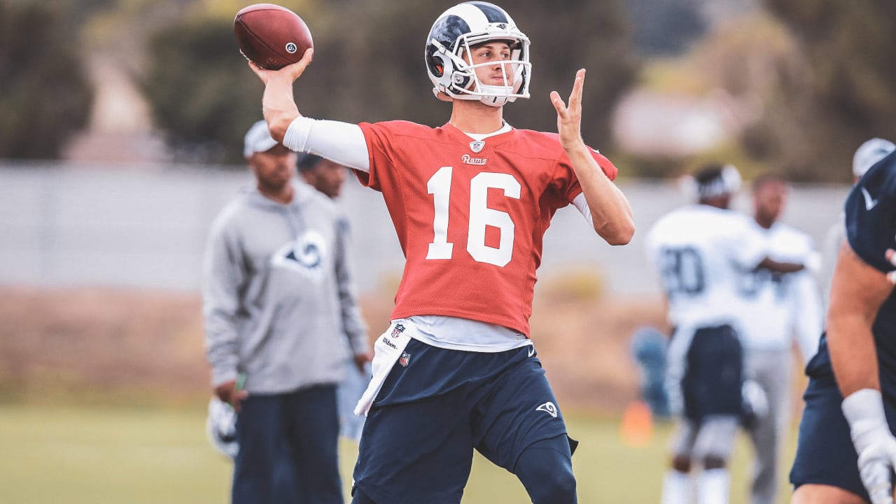 Los Angeles Rams quarterback Jared Goff (16) off balance after