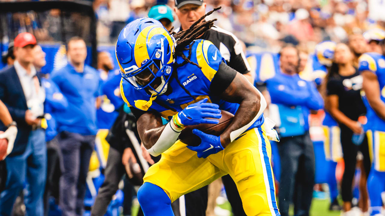 Los Angeles Rams running back Darrell Henderson Jr. pushes over the goal  line for a rushing touchdown