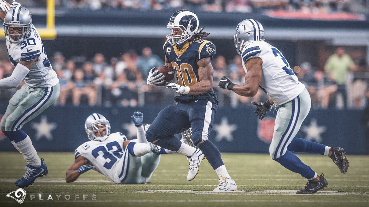 Los Angeles Rams running back Todd Gurley scores past Dallas Cowboys  cornerback Chidobe Awuzie during the first half in an NFL divisional  football playoff game Saturday, Jan. 12, 2019, in Los Ange …