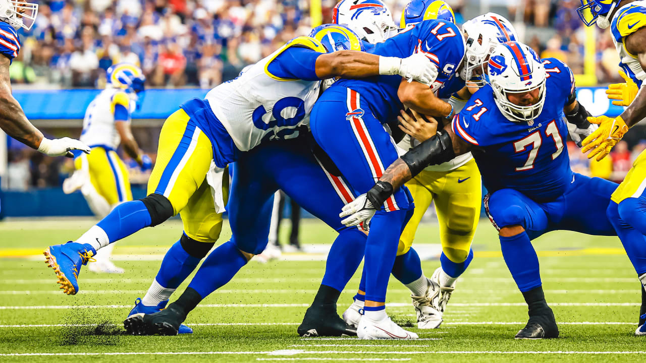 Los Angeles Rams defensive lineman Aaron Donal sacks Buffalo Bills  quarterback Josh Allen