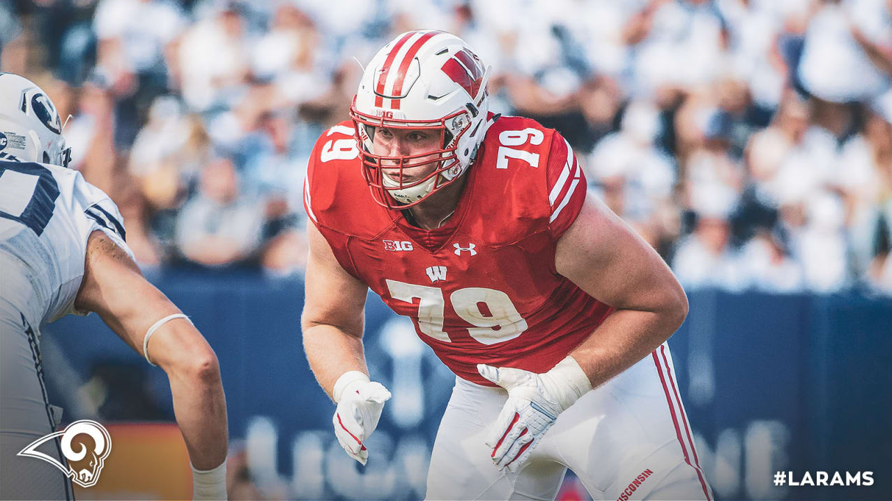 FILE - In this Sept. 22, 2018 file photo Wisconsin offensive lineman David  Edwards, center, blocks Iowa defensive end Chauncey Golston, left, from  quarterback Alex Hornibrook, right, during the first half of