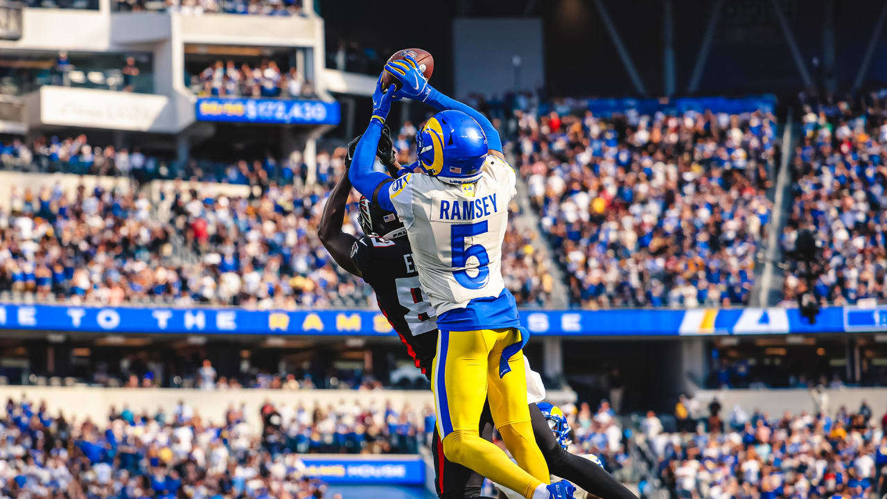 Los Angeles Rams defensive back Jalen Ramsey celebrates his interception in  the end zone in front