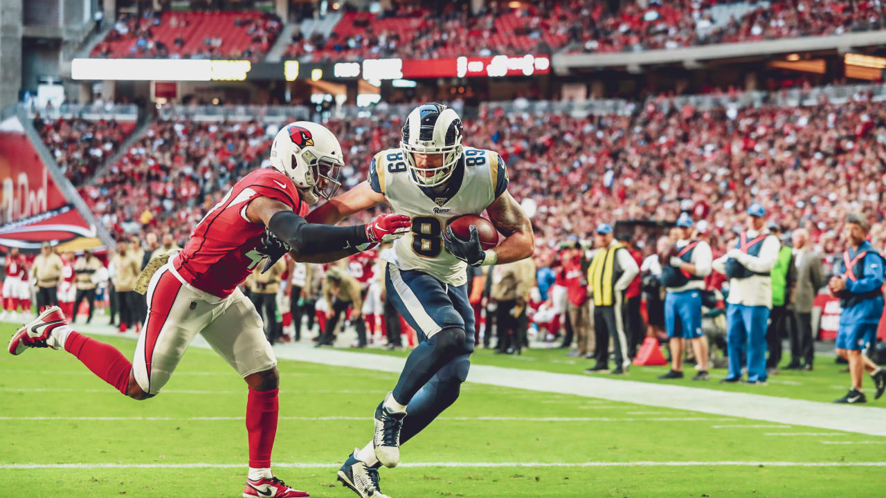 Tyler Higbee drags across the field for 25-yard catch and run on third down