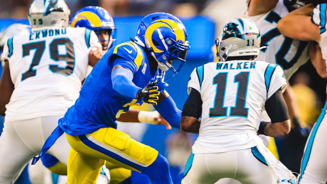 Los Angeles Rams cornerback Jalen Ramsey (5) grabs the jersey of Carolina  Panthers quarterback PJ Walker (11) for a sack during an NFL football game  Sunday, Oct. 16, 2022, in Inglewood, Calif. (