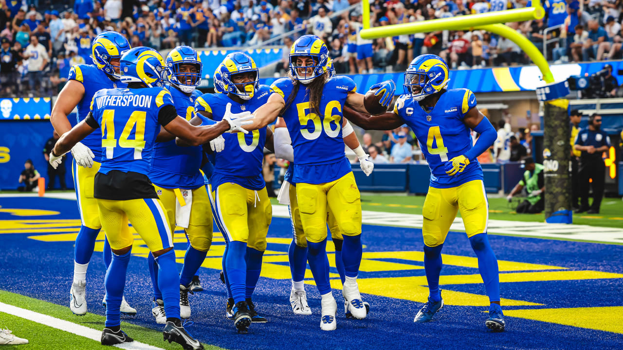 Los Angeles Rams linebacker Christian Rozeboom snags a deflected throw over the middle for an