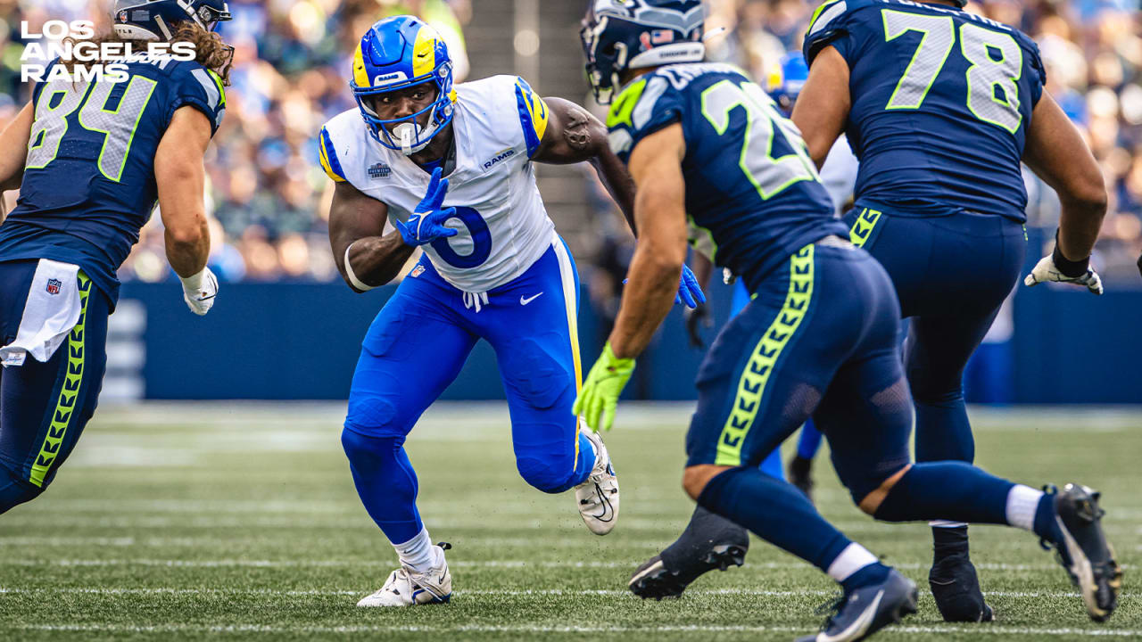 Los Angeles Rams linebacker Byron Young (0) runs during the first half of  an NFL preseason