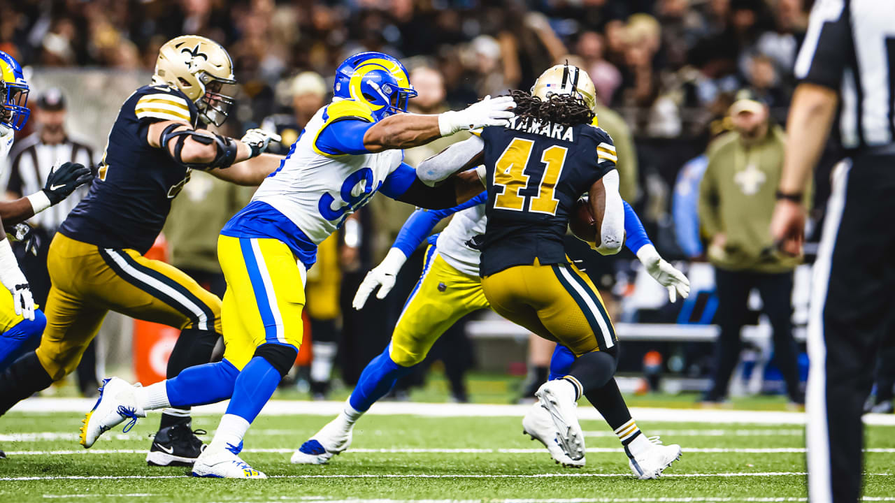 Los Angeles Rams defensive lineman Aaron Donald tackles Saints running