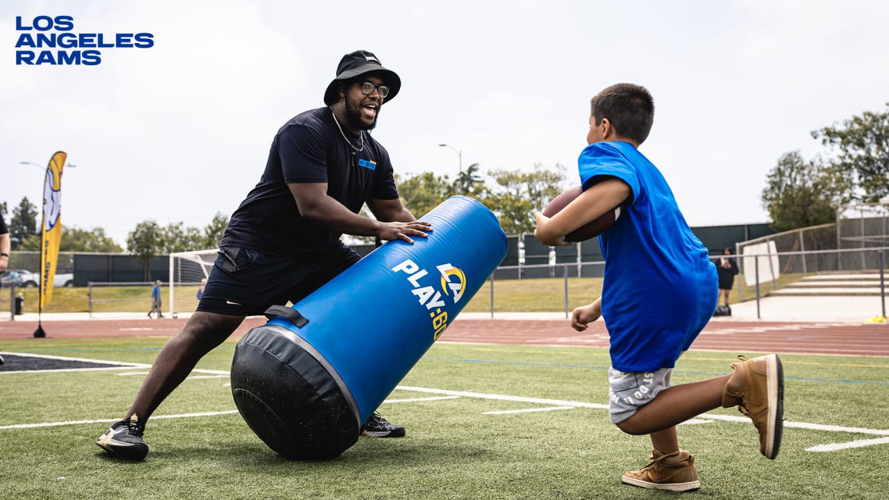 COMMUNITY PHOTOS Puka Nacua, Davis Allen & more rookies coach LA kids