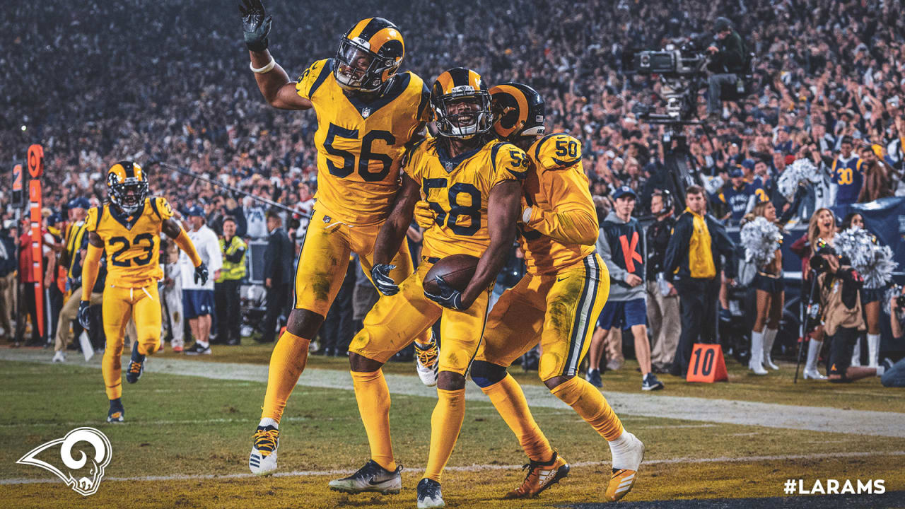 Los Angeles Rams defensive end Aaron Donald (99) celebrates a defensive  stop with defensive tackle Sebastian Joseph-Day (69) during the second half  of an NFL football game against the Tampa Bay Buccaneers