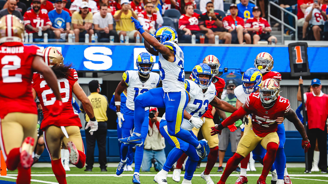 Los Angeles Rams running back Kyren Williams slips inside for his second  touchdown of the day