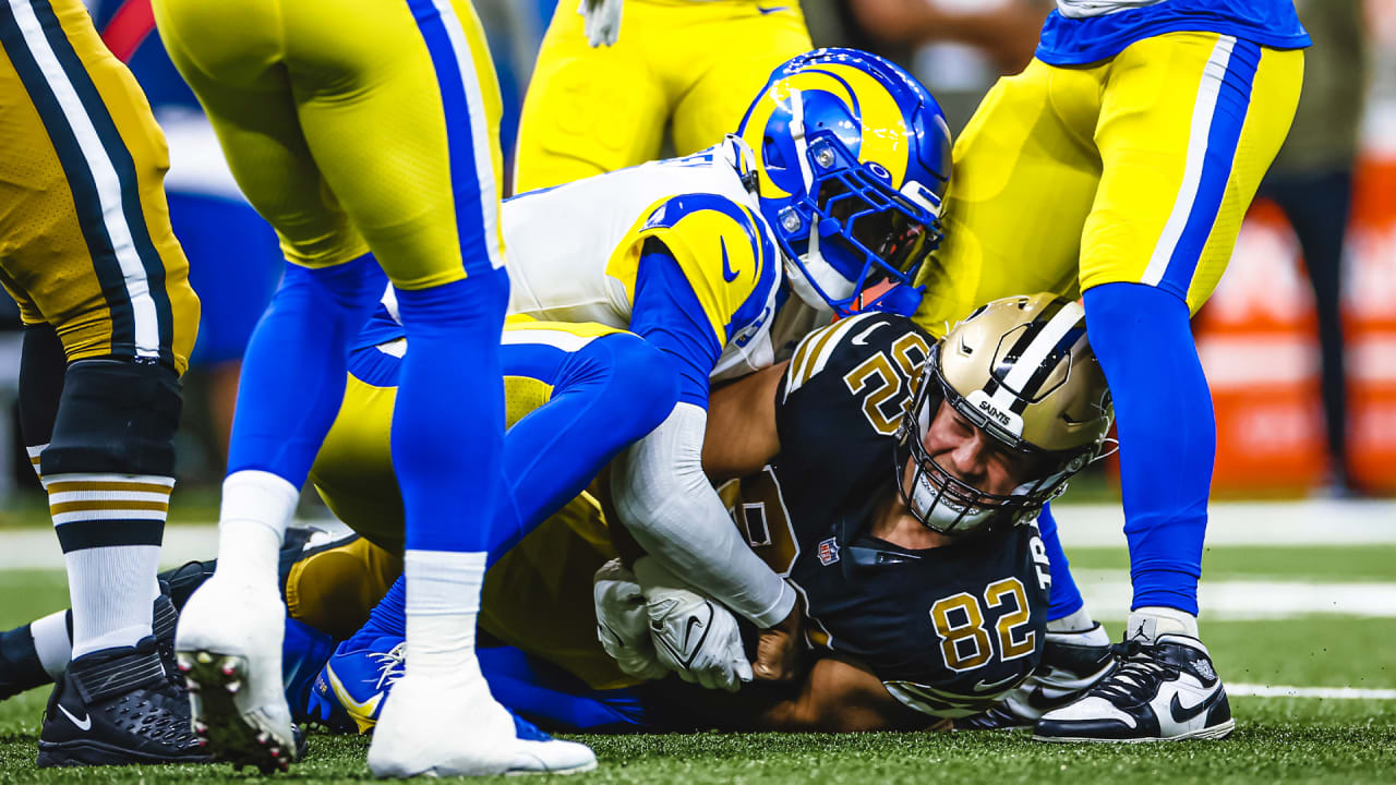 New Orleans Saints tight end Adam Trautman (82) runs the ball up