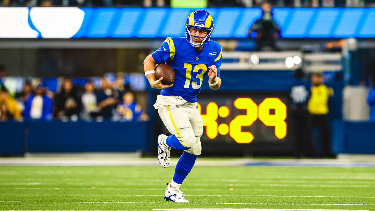 John Wolford of the Los Angeles Rams throws a pass against Devon