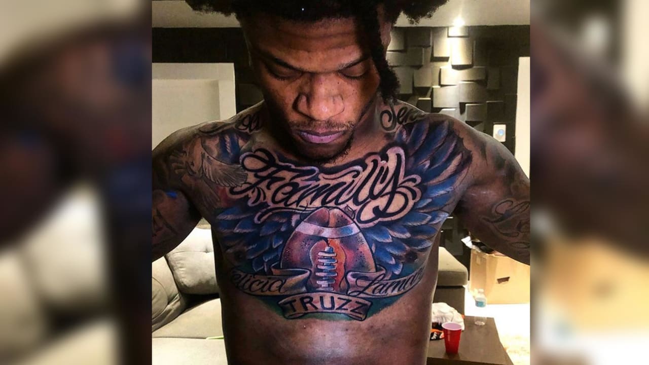 Lamar Jackson Got a Massive Faith, Family and Football Tattoo