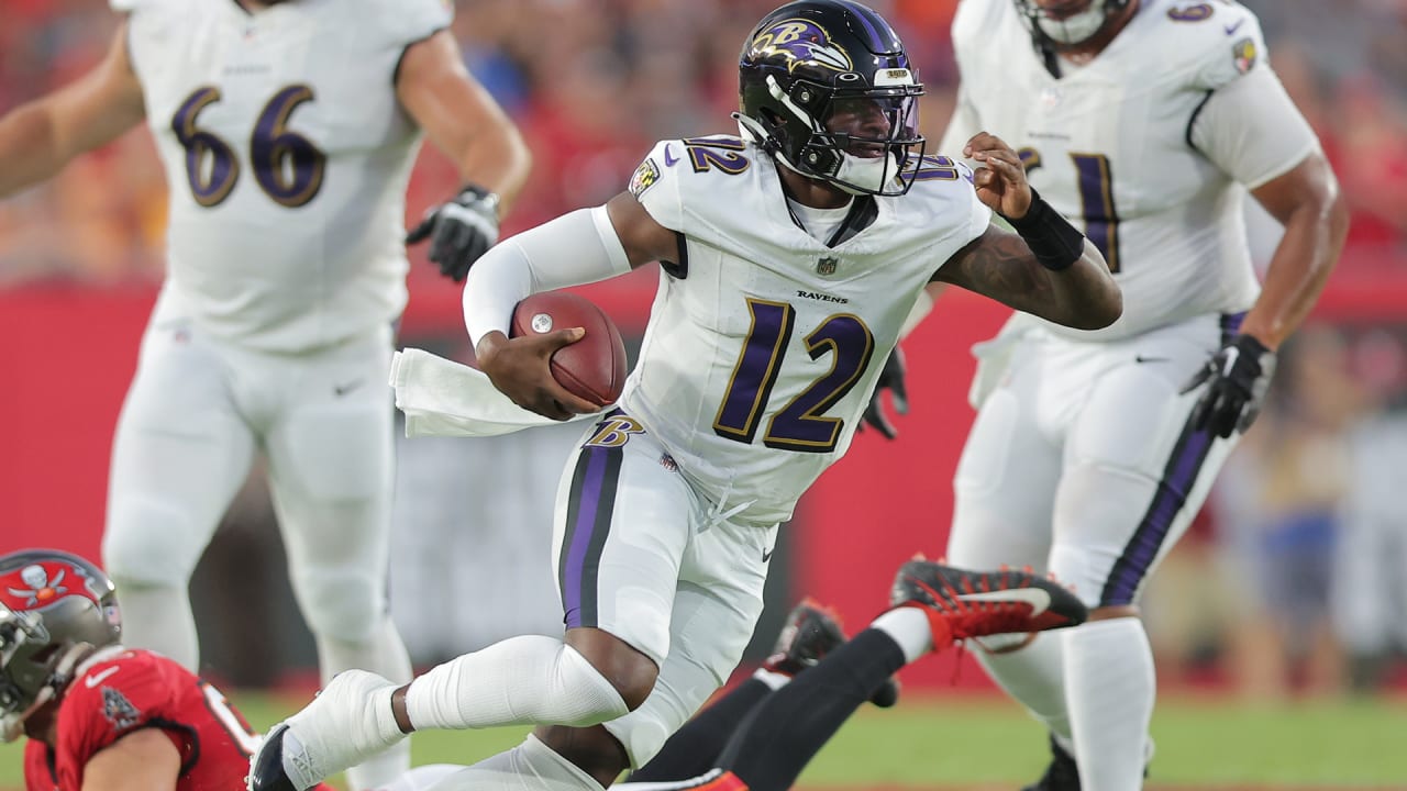 Anthony Brown of the Baltimore Ravens is sacked by T.J. Watt of