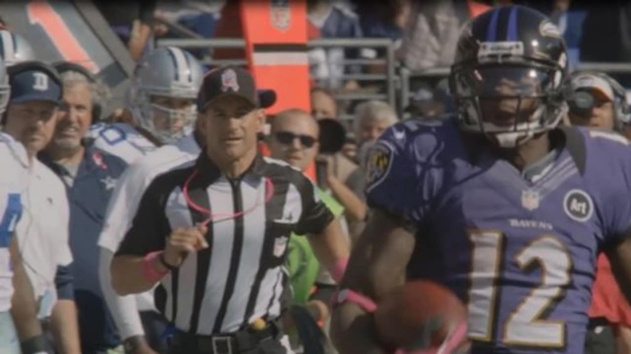 Baltimore Ravens wide receiver Jacoby Jones takes a kickoff the