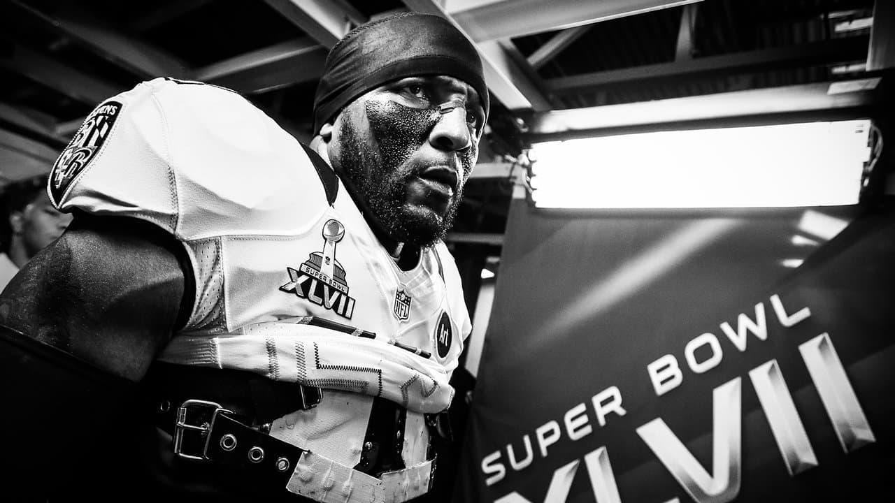 Baltimore Ravens - Posing with Ray Lewis' Super Bowl XLVII game jersey.