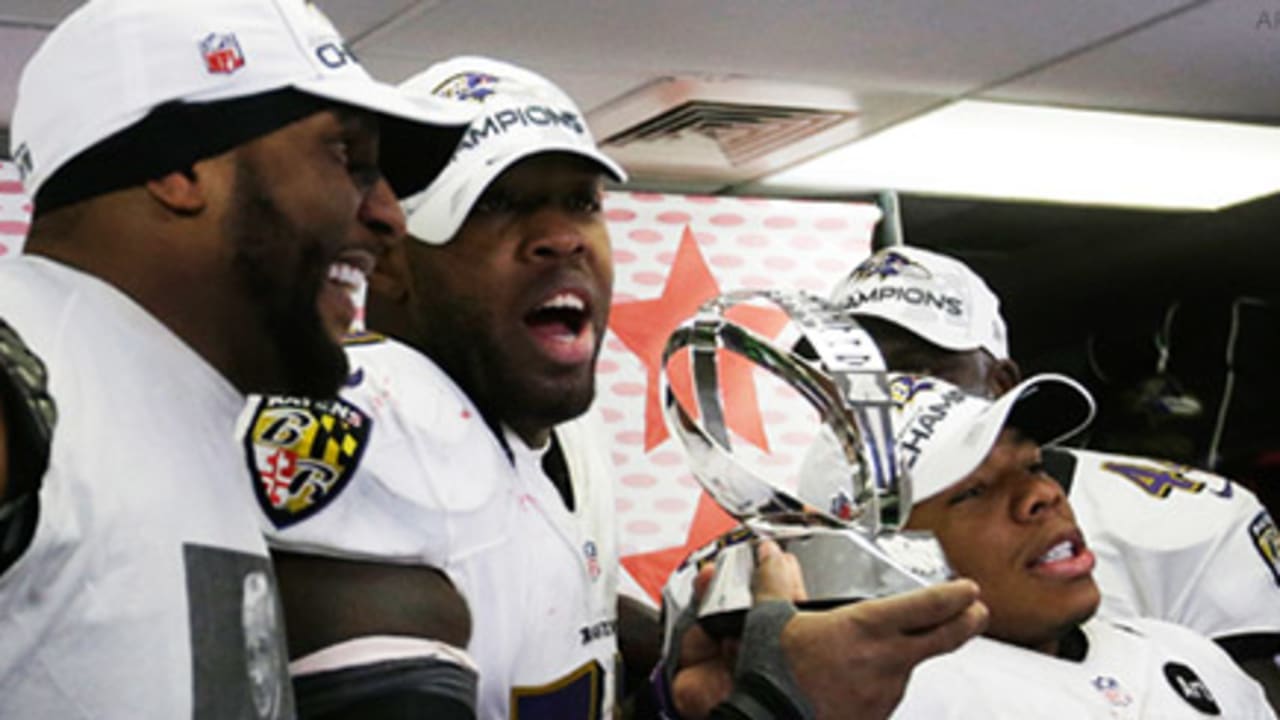 Ray Lewis, Terrell Suggs & Ray Rice with AFC trophy.