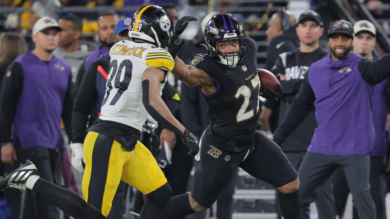 Baltimore Ravens running back J.K. Dobbins (27) celebrates a touchdown  during the first half of an NFL football game against the Pittsburgh  Steelers in Pittsburgh, Sunday, Dec. 11, 2022. (AP Photo/Don Wright