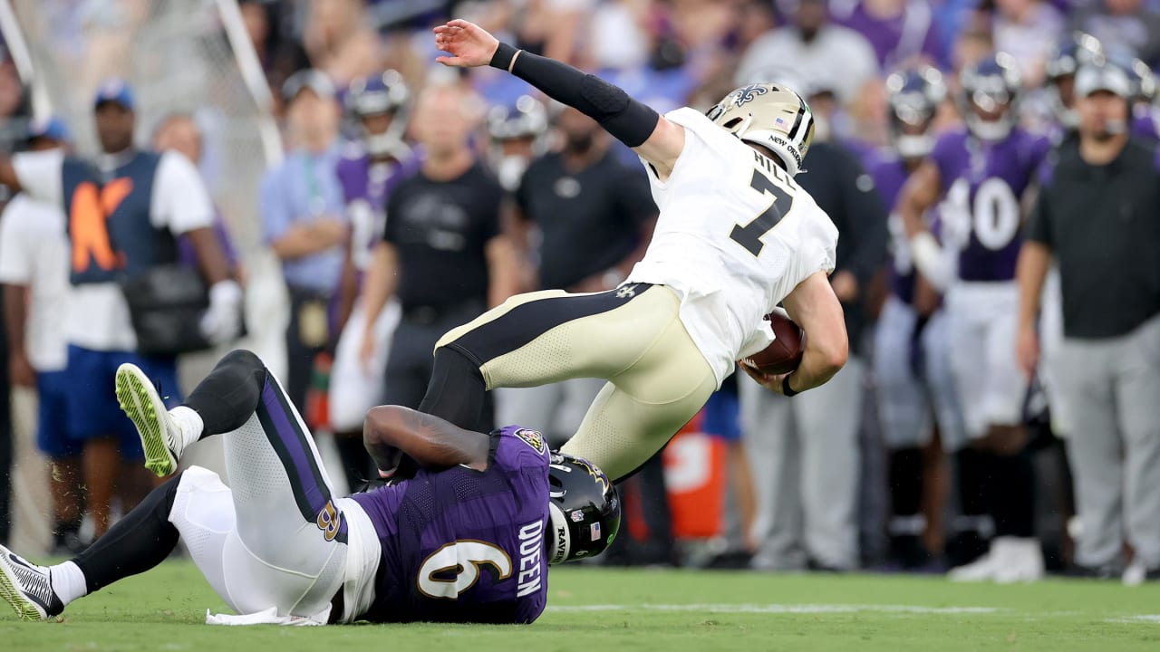 Baltimore Ravens linebacker Patrick Queen (6) greets quarterback Lamar  Jackson prior to an NFL preseason football game against the New Orleans  Saints, Saturday, Aug. 14, 2021, in Baltimore. (AP Photo/Nick Wass Stock