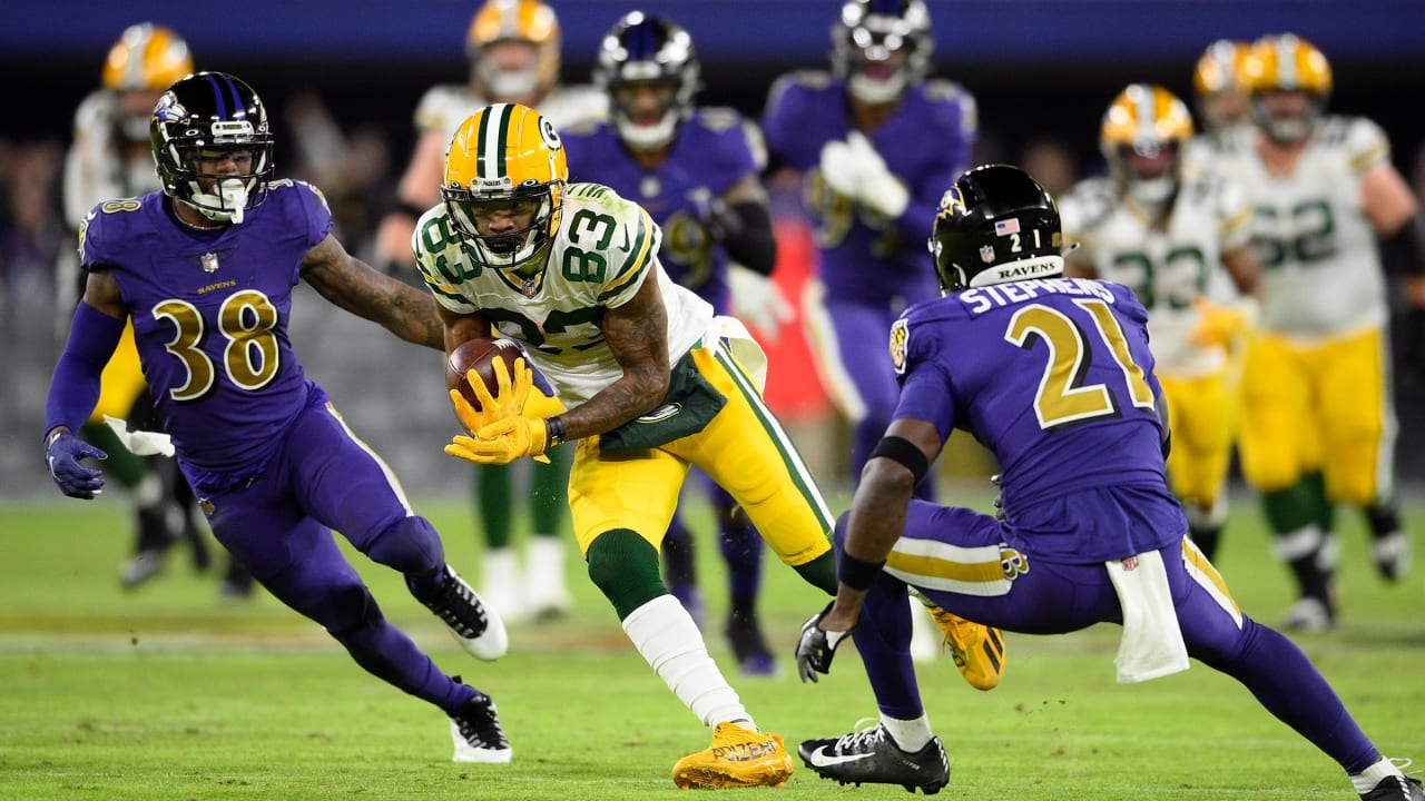 BALTIMORE, MD - DECEMBER 19: Packers wide receiver Davante Adams (17) runs  after a catch during the Green Bay Packers versus Baltimore Ravens NFL game  at M&T Bank Stadium on December 19