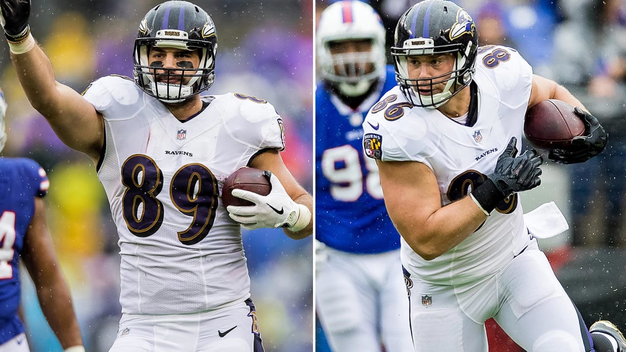 Baltimore Ravens tight end Hayden Hurst (81) runs with the ball