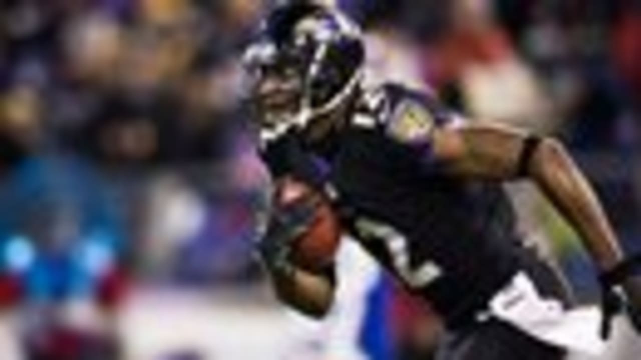 Baltimore Ravens wide receiver Jacoby Jones takes a kickoff the