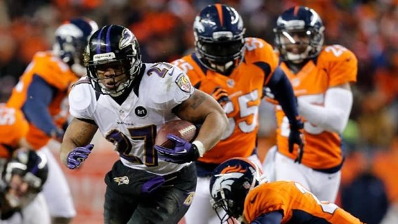 The Baltimore Ravens' Jacoby Jones (12) and running back Ray Rice appear  deflated on the sidelines after an interception by quarterback Joe Flacco  in the second quarter against the Denver Broncos at