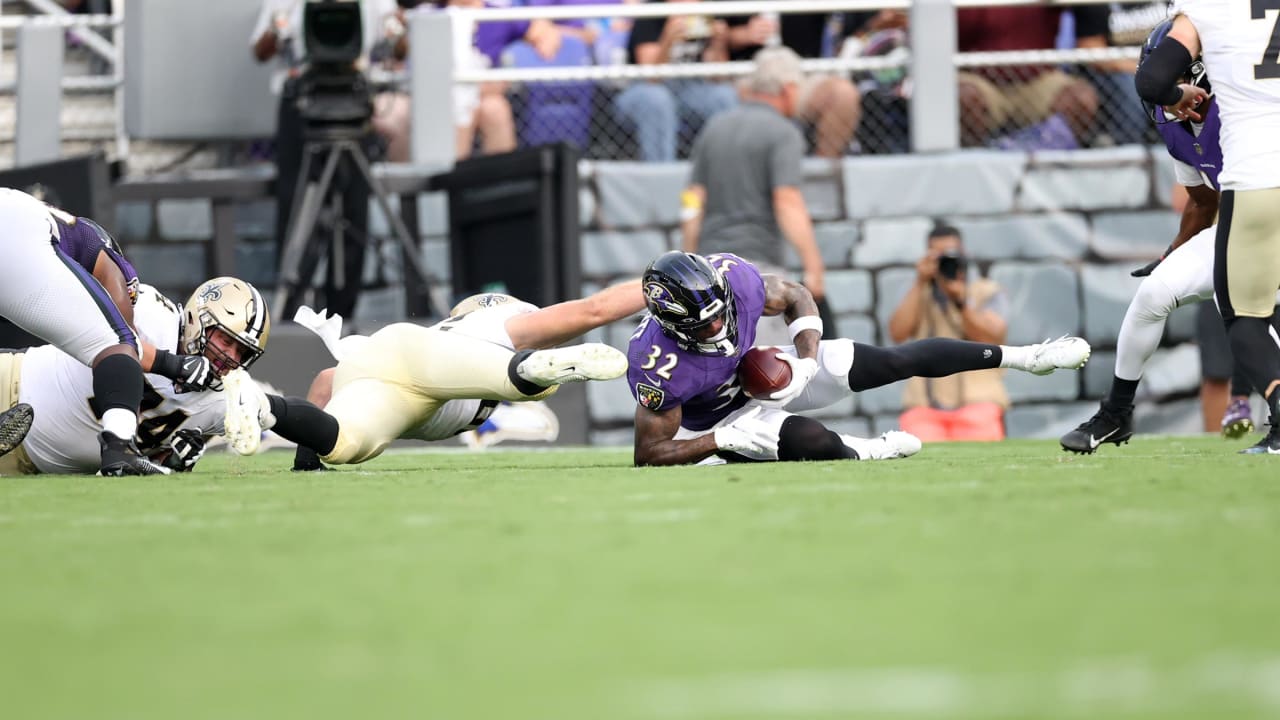 Baltimore Ravens linebacker Patrick Queen (6) greets quarterback Lamar  Jackson prior to an NFL preseason football game against the New Orleans  Saints, Saturday, Aug. 14, 2021, in Baltimore. (AP Photo/Nick Wass Stock