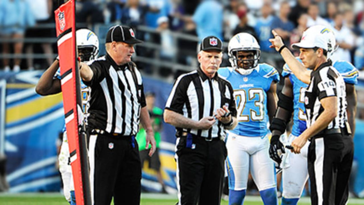 Referee Gene Steratore checks the replay of the Philadelphia