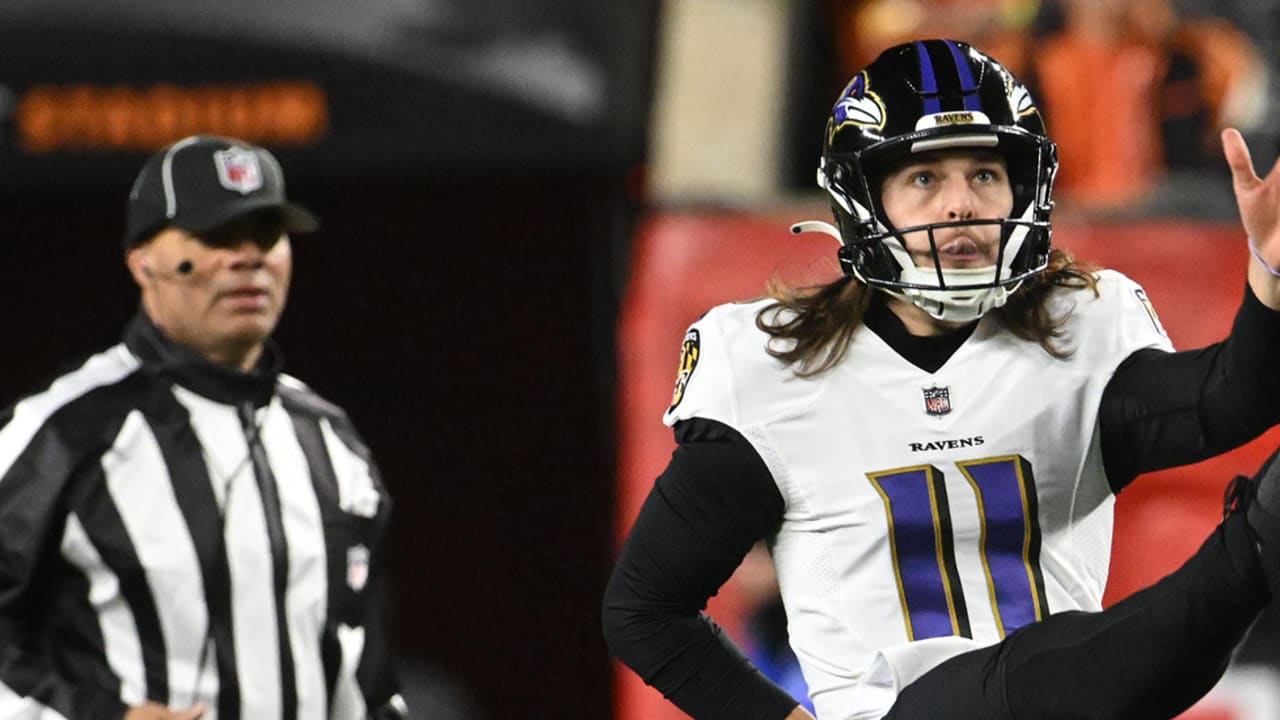 Baltimore Ravens punter Jordan Stout (11) follows through on a kick in the  first half of an NFL football game against the New England Patriots,  Sunday, Sept. 25, 2022, in Foxborough, Mass. (