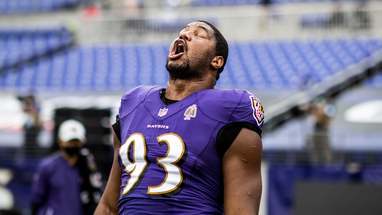 AFC defensive end Calais Campbell of the Jacksonville Jaguars is named  defensive player of the game while he holds the Pro Bowl trophy with  quarterback Lamar Jackson of the Baltimore Ravens (8)