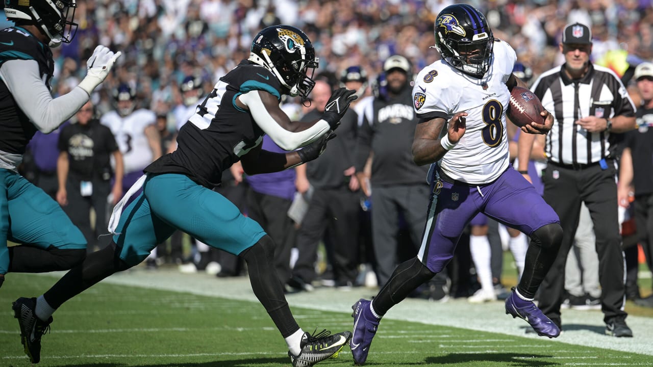 Lamar Jackson of the Baltimore Ravens scrambles against the