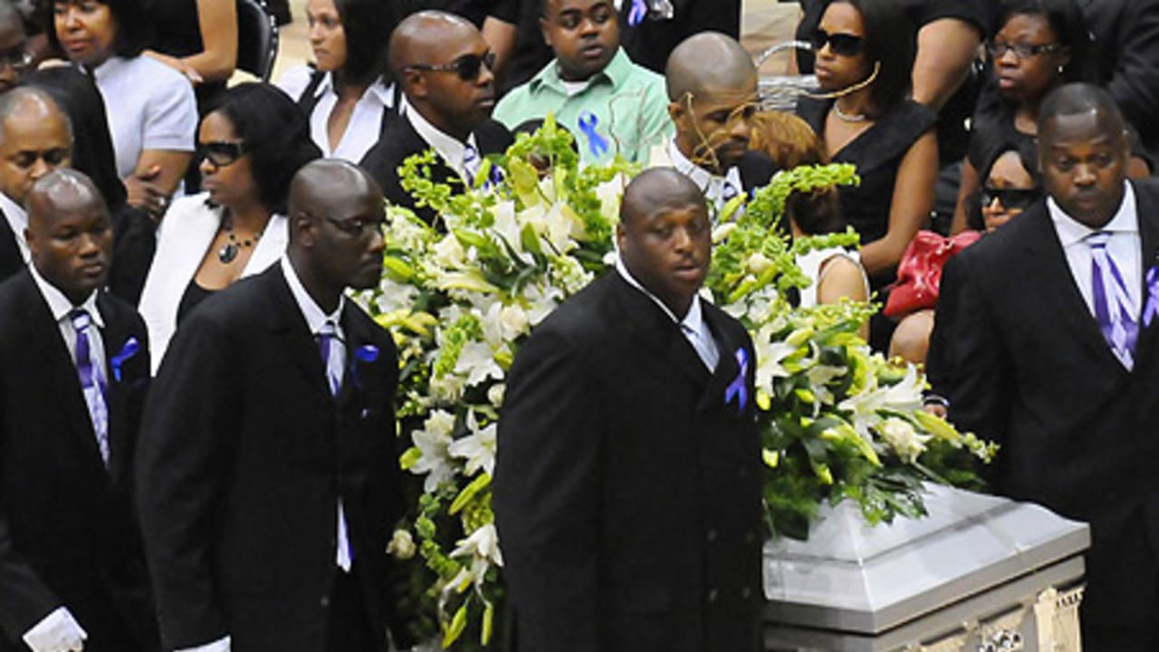The family of Steve McNair, including his brother, Fred McNair, right, his  mother, Lucille McNair, second from right, and his wife, Mechelle McNair,  left, attend the funeral service for Steve McNair in