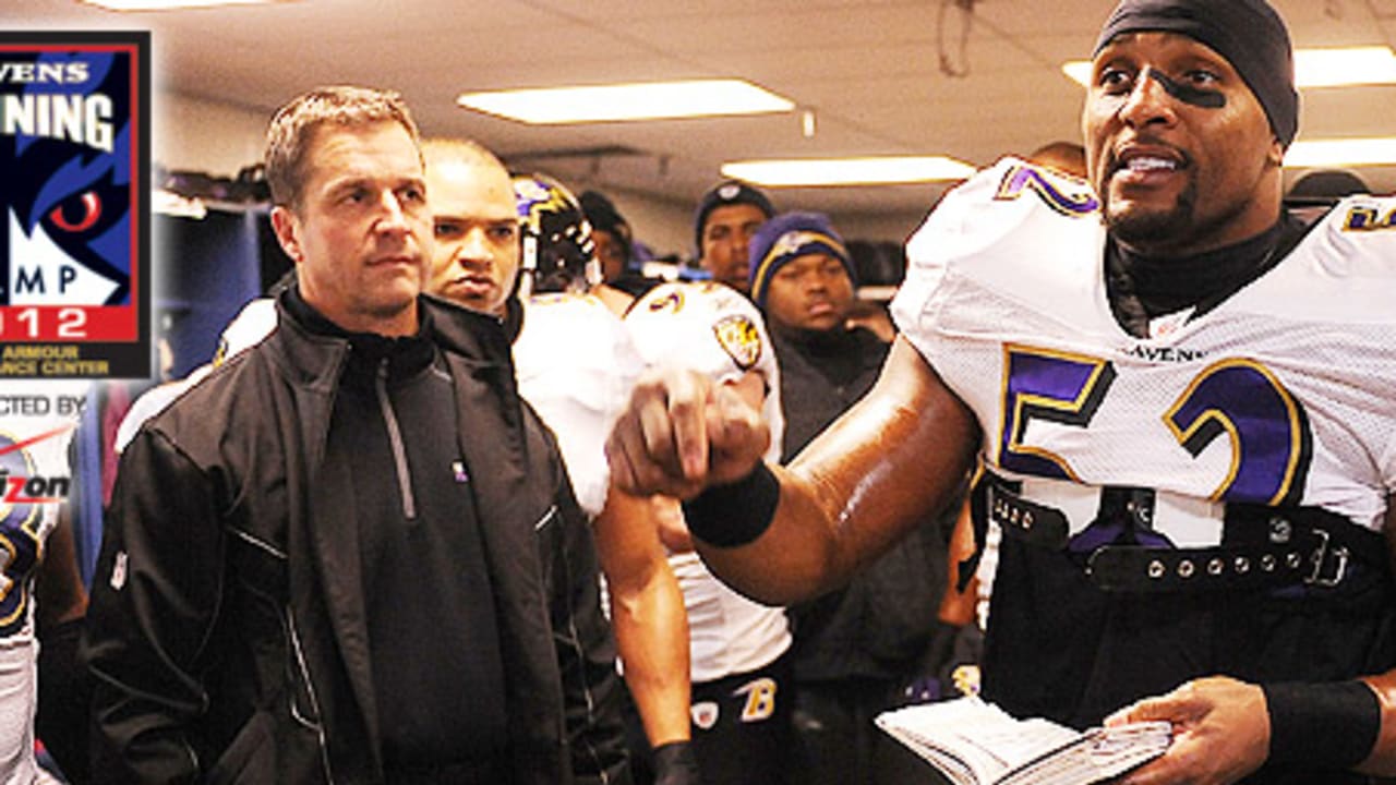 Baltimore Ravens' Ray Lewis, left, and Ray Rice talk during a team