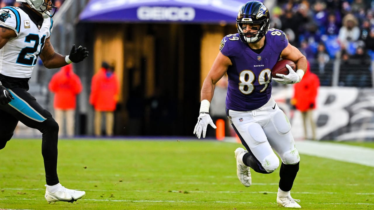 Mark Andrews makes a reception and is pursued by a defender.