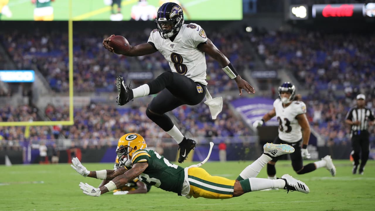 Lamar Jackson of the Baltimore Ravens runs the ball against the