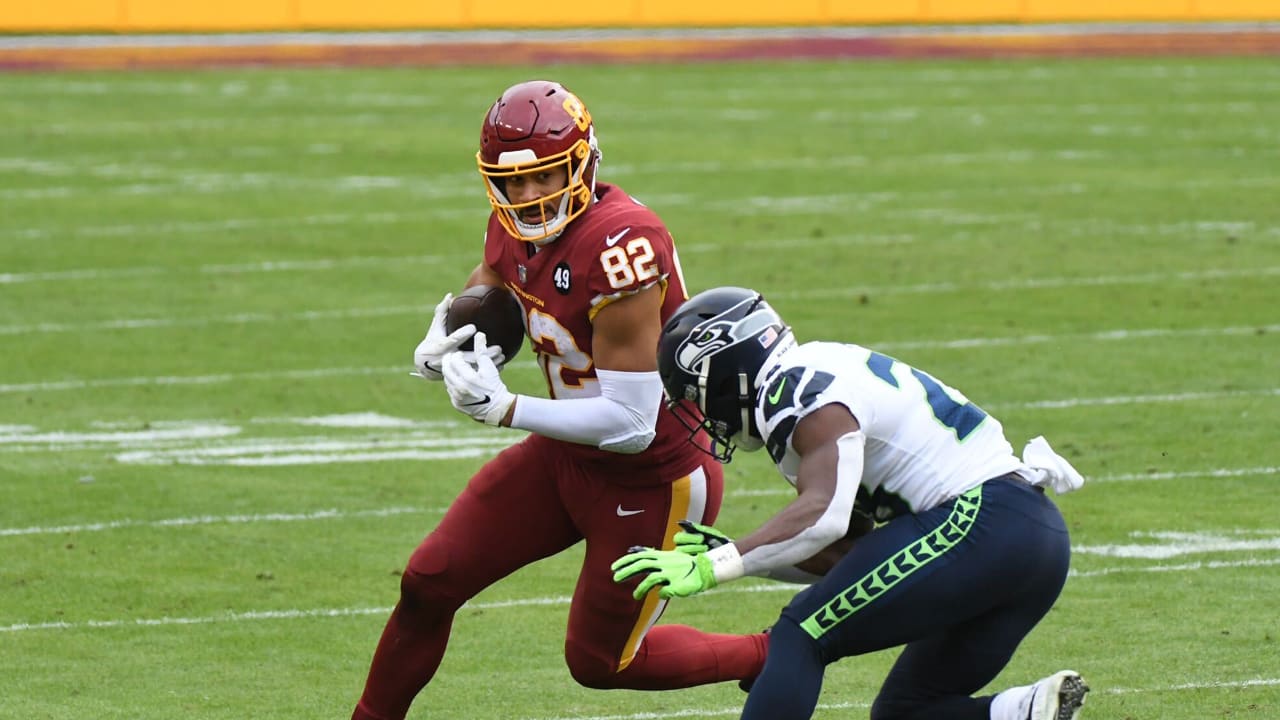 Washington Commanders tight end Logan Thomas (82) runs during an