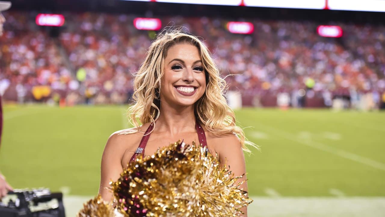 LANDOVER, MD - SEPTEMBER 25: Washington Commanders cheerleader performs  during the game between the Philadelphia Eagles and the Washington  Commanders on September 25, 2022 at Fedex Field in Landover, MD. (Photo by