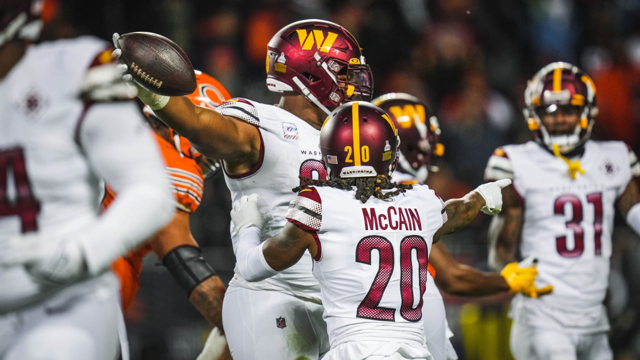 Washington Commanders tight end Logan Thomas makes a leaping grab