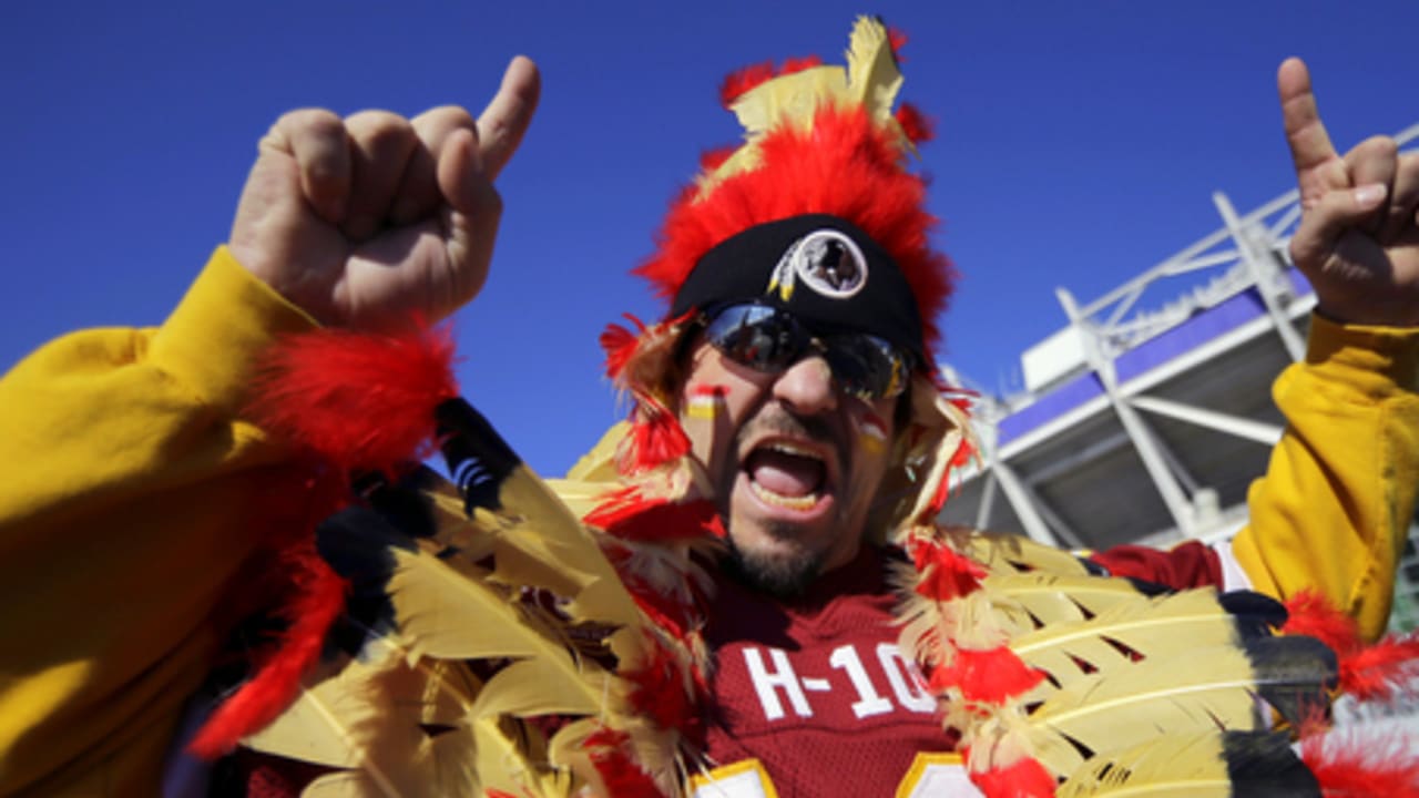 Redskins fans known as the 'Hogfarmers' help youth