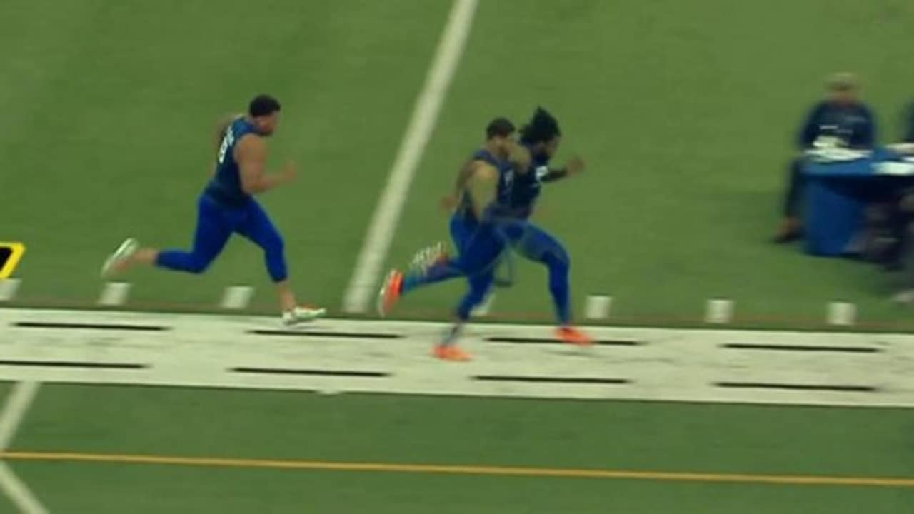 Offensive linemen race in simulcam 40yard dash