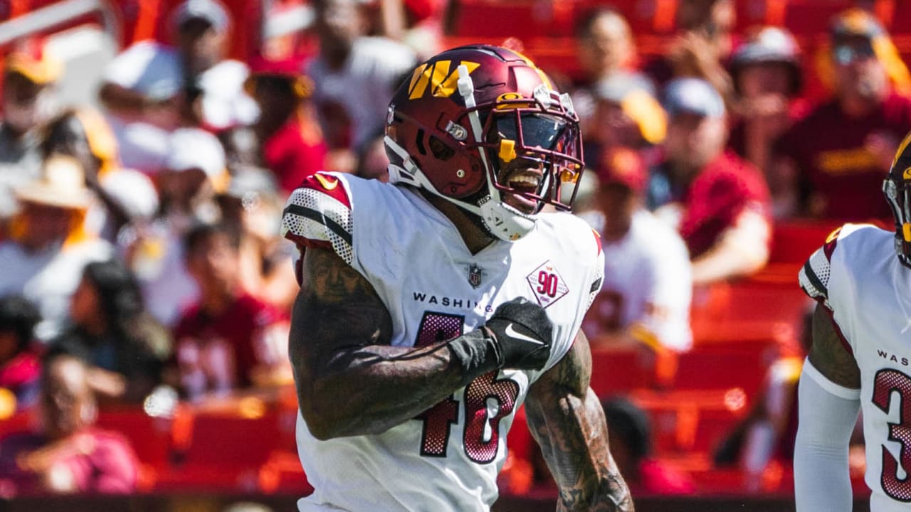 Washington Commanders tight end Armani Rogers (88) catches a pass