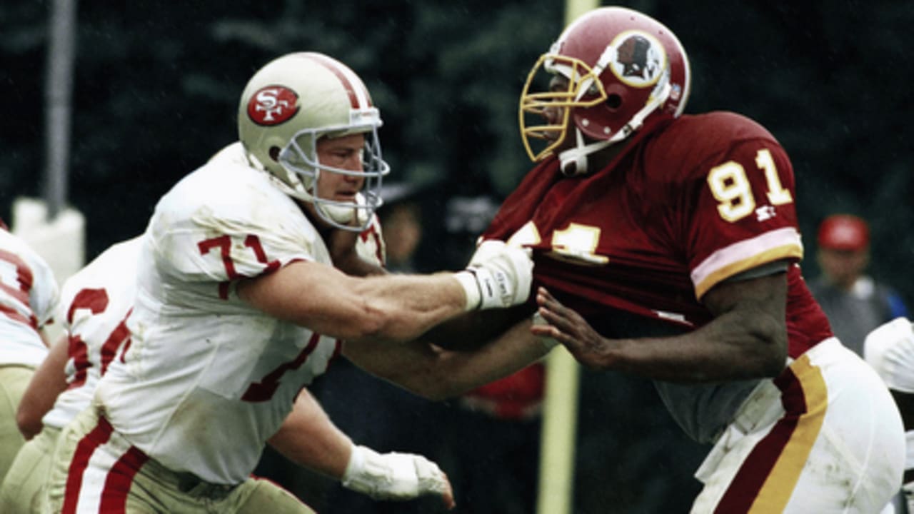 San Francisco, California, USA. 12th Jan, 1991. San Francisco 49ers vs  Washington Redskins at Candlestick Park Saturday, January 12, 1991. 49ers  beat Redskins 28-10. Redskin quarterback Mark Rypien (11) hands off to