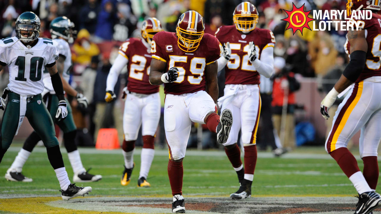 Washington Redskins' London Fletcher (59) celebrates his