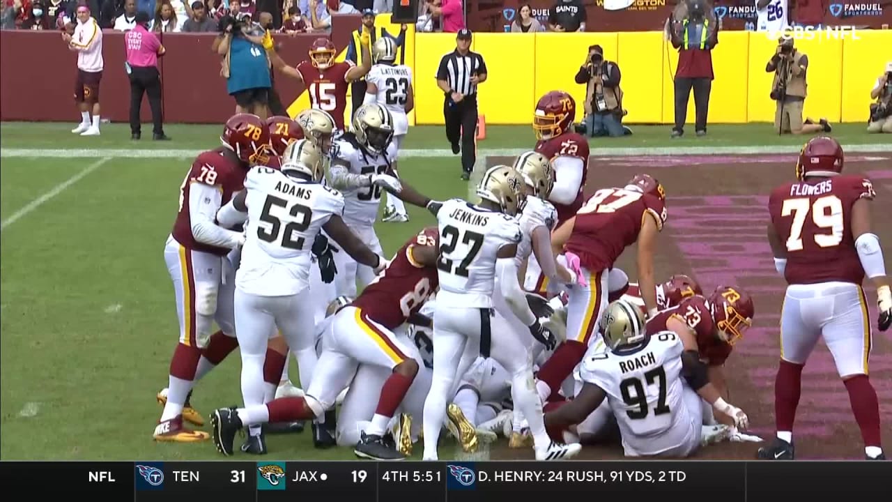 Washington Football Team running back Antonio Gibson (24) scores a  touchdown around Las Vegas R …