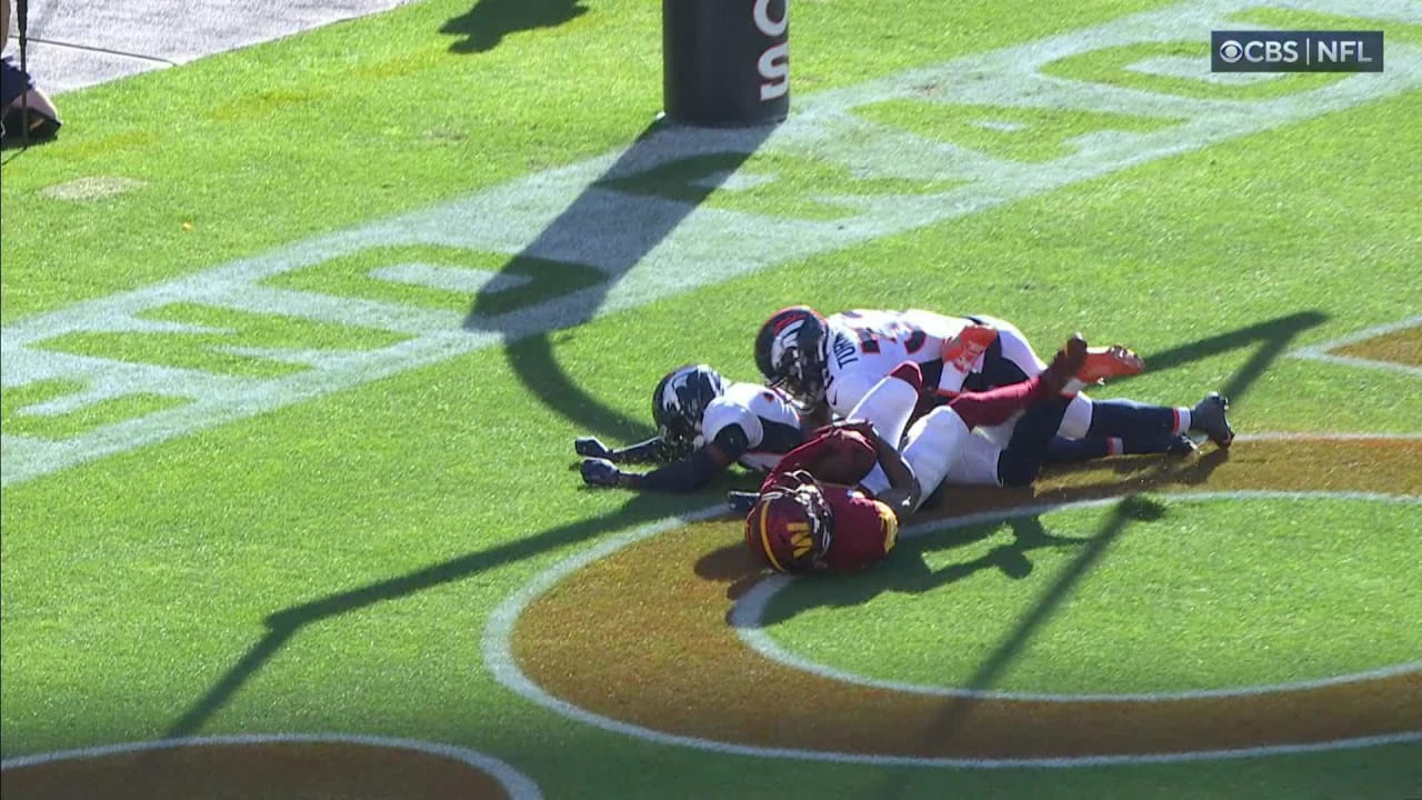 Washington Commanders wide receiver Terry McLaurin scores TD after running  back Brian Robinson's fumble via truck stick at goal line