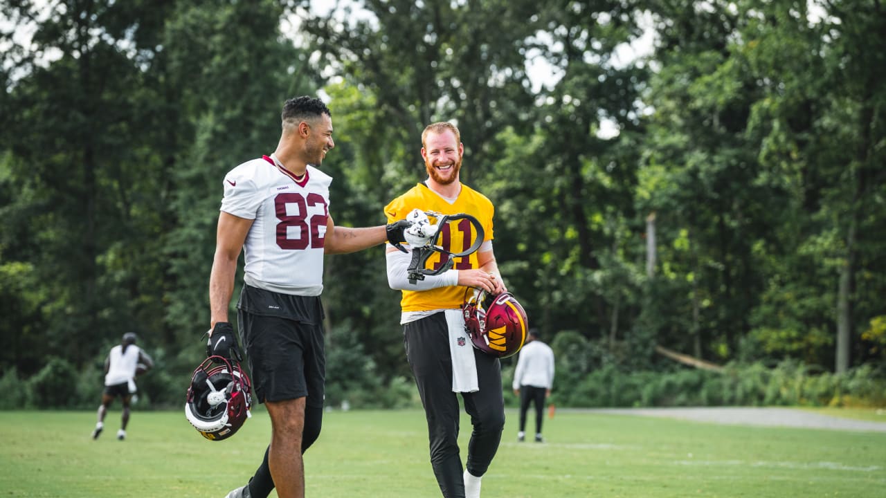 Washington Commanders tight end Logan Thomas (82) runs during an