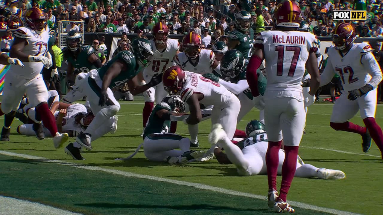 Washington Commanders wide receiver Terry McLaurin scores TD after running  back Brian Robinson's fumble via truck stick at goal line